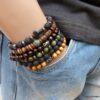 N5674m Bracelet elastique homme bouddha métal noir perles bois marron - Bijoux Bracelets en ligne Ninanina