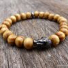 N5674n Bracelet elastique homme bouddha métal noir perles bois marron - Bijoux Bracelets en ligne Ninanina