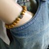N5674v Bracelet homme perles bois marron bouddha noir NINANINA
