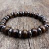 N5675 Bracelet elastique mala homme perles bois marron rondelles métal noir - Bijoux Bracelets en ligne Ninanina