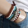 N5676b Bracelet elastique perles turquoises blanches - Bijoux Bracelets en ligne ninanina