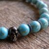 N5678a Bracelet homme stretch elastique perles turquoises blanches tete de mort métal noir NINANINA