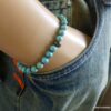 N5678b Bracelet homme stretch elastique perles turquoises blanches tete de mort métal noir NINANINA