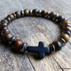 N5683 Bracelet homme stretch elastique perles oeil de tigre croix noire NINANINA