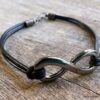 N5687e Bracelet homme femme cordon cuir infini métal noir NINANINA