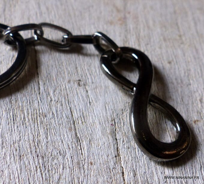 N5708 Porte-clé symbole infini et chaine métal noir - Accessoires Porte clés en ligne Ninanina