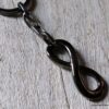 N5708c Porte-clé symbole infini et chaine métal noir - Accessoires Porte clés en ligne Ninanina