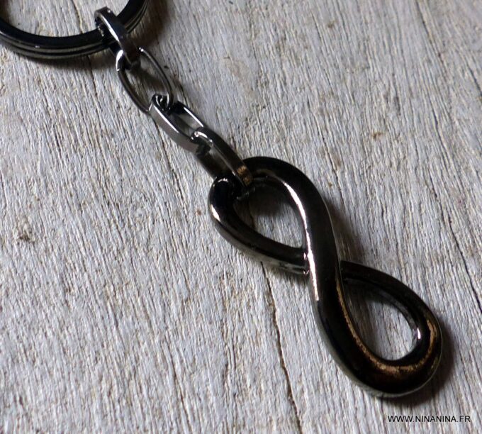 N5708c Porte-clé symbole infini et chaine métal noir - Accessoires Porte clés en ligne Ninanina