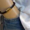 N5723a Bracelet homme cuir tressé noir fermoir aimanté acier inoxydable doré NINANINA