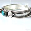 N6046j Bracelet manchette artisanal ethnique indien avec pierre fine turquoise et oeil de tigre ovale sertie - Bijoux Bracelets en ligne Ninanina