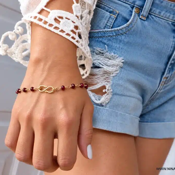 N6096f Bracelet grenat rouge femme fermoir symbole infini Plaqué Or – Bijoux Bracelets en ligne Ninanina