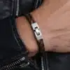 N8585b Bracelet Cuir Plat Tressé Marron Et Fermoir Rectangulaire Argenté - Bijoux Bracelets hommes en ligne Ninanina