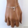 N6547b Bracelet swarovski infini argent 925 massif perles blanches - Bijoux Bracelets en ligne Ninanina