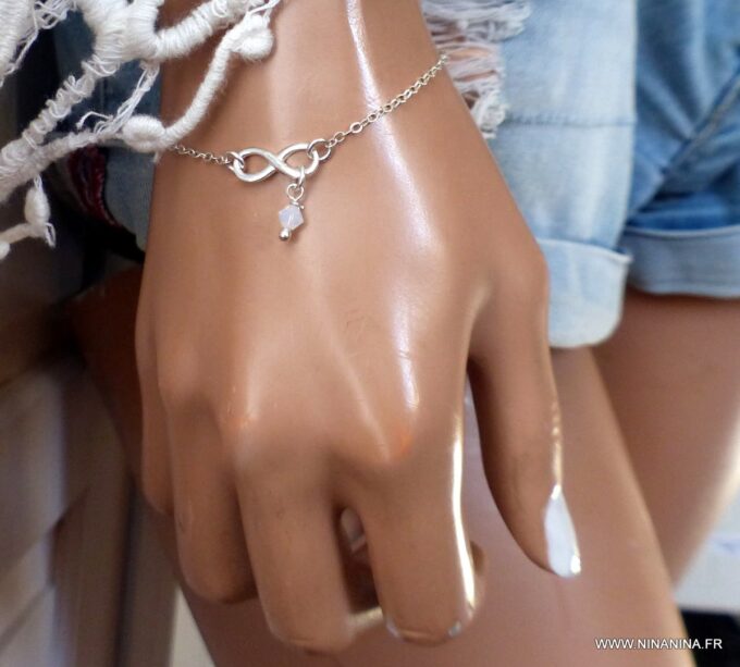 N6547d Bracelet swarovski infini argent 925 massif perles blanches - Bijoux Bracelets en ligne Ninanina