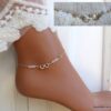 N6551b Chaine cheville swarovski perles blanches symbole infini argent - Bijoux Chaines en ligne Ninanina