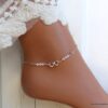 N6551e Chaine cheville swarovski perles blanches symbole infini argent - Bijoux Chaines en ligne Ninanina