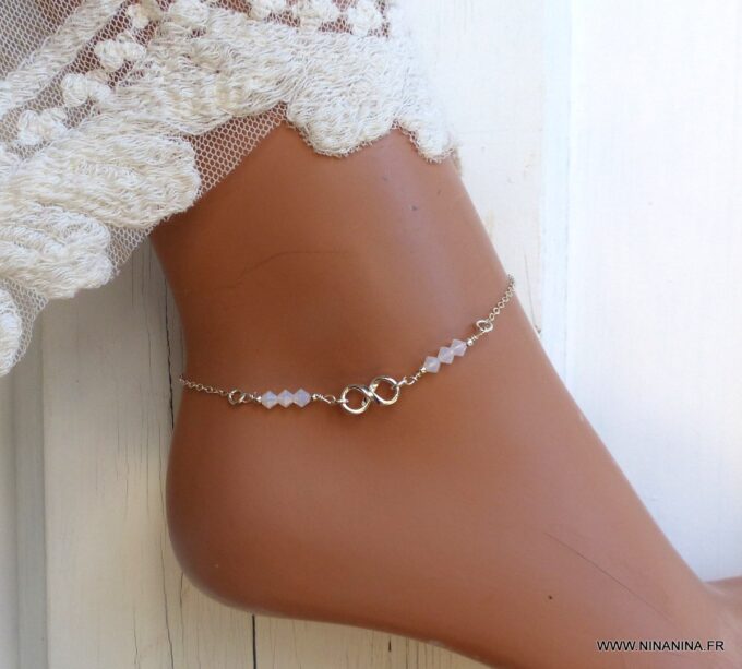 N6551e Chaine cheville swarovski perles blanches symbole infini argent - Bijoux Chaines en ligne Ninanina