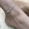 N6551c Chaine cheville swarovski perles blanches symbole infini argent 925 - Bijoux de pied en ligne Ninanina