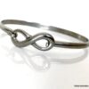 N6802c Jonc infinity acier inoxydable argent - bracelet pour femme - Bijoux Bracelets en ligne Ninanina