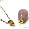 N6860f Sautoir parfum rose acier doré pendentif forme goutte - Bijoux Colliers en ligne Ninanina
