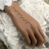 N6954c Bracelet harnais de main bague chaine plaqué or - Bijoux Bracelets en ligne Ninanina