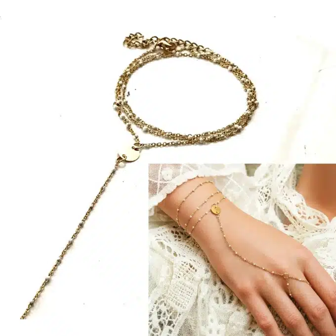 N7046f Bracelet à doigt avec bague perle blanche émaillée artisanale et acier inoxydable doré - Bijoux de main en ligne Ninanina