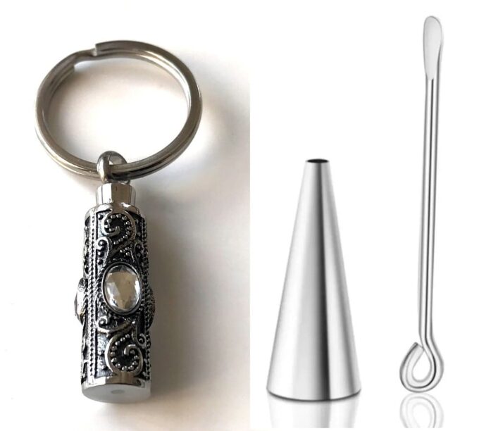 N7325a Porte clé Bijou pendentif parfum vide acier inoxydable - Accessoires parfumeurs en ligne Ninanina