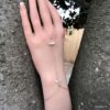 N7561b Bracelet zirconium femme bague chaine plaqué or - Bijoux Bracelets en ligne Ninanina