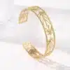 N7714b Bracelet manchette ajouré acier doré femme 12mm - Bijoux Bracelets en ligne Ninanina