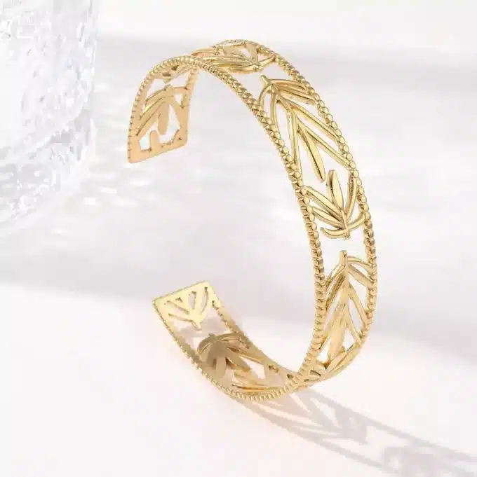 N7714b Bracelet manchette ajouré acier doré femme 12mm - Bijoux Bracelets en ligne Ninanina