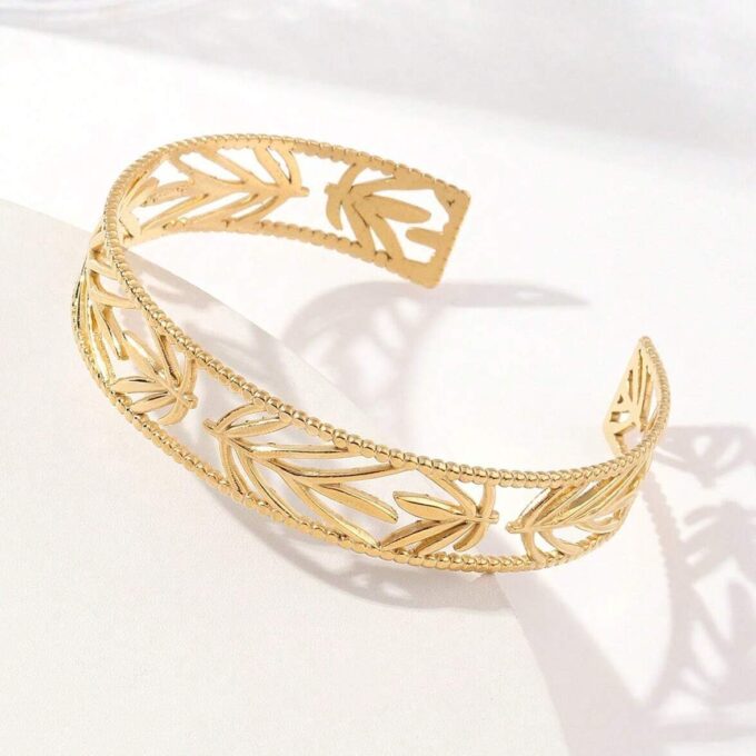 N7714c Bracelet manchette ajouré acier doré femme 12mm - Bijoux Bracelets en ligne Ninanina