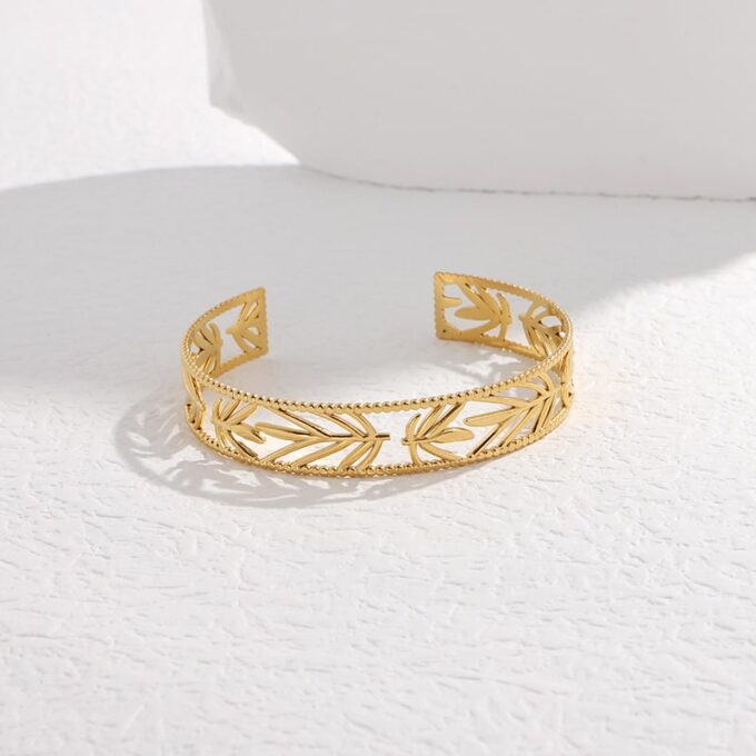 N7714f Bracelet manchette ajouré acier doré femme 12mm - Bijoux Bracelets en ligne Ninanina