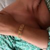 N7714j Bracelet manchette ajouré acier doré femme 12mm - Bijoux Bracelets en ligne Ninanina